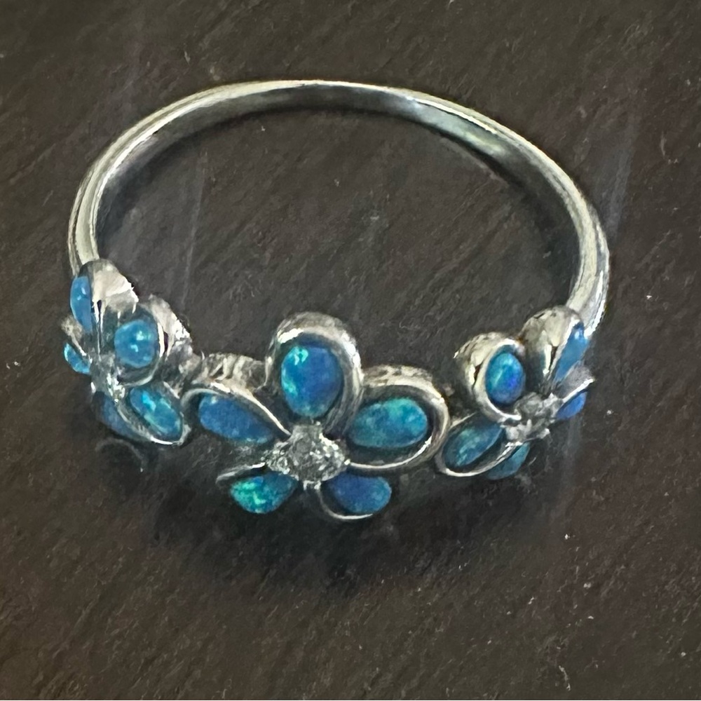 Silver .925 ring. Size 9. Gemstone unknown. Purchased at jewelry store in Hawaii